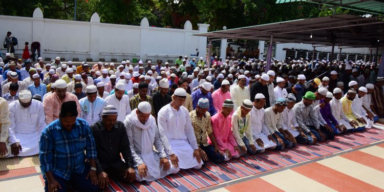 Members of Muslim Community offer Namaaz on Eid at
Unit-4 Masjid, Saturday