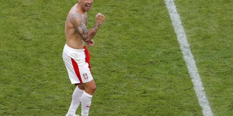 Aleksandar Kolarov celebrates after scoring the winner against Costa Rica at Samara Arena, Sunday