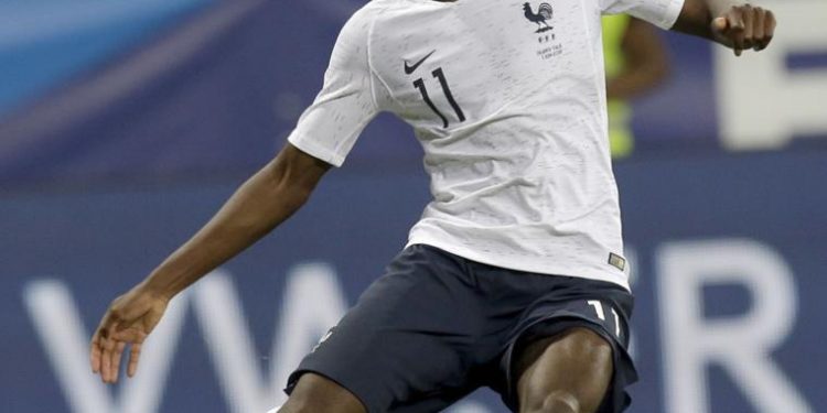 Stunning strike: France forward Ousmane Dembele about to connect his shot for his side’s third goal against Italy at Nice, Friday