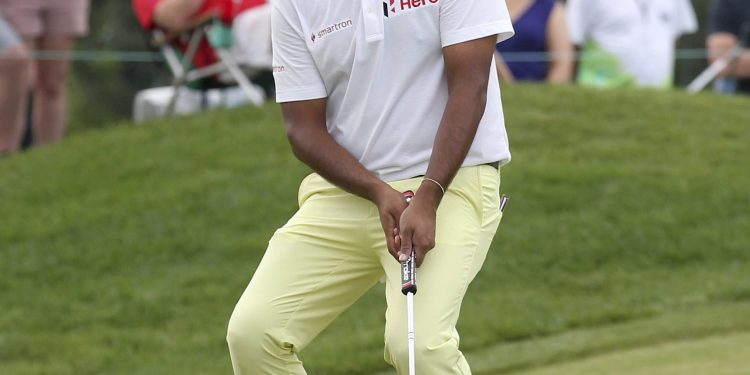 Anirban Lahiri reacts after missing a put, Sunday