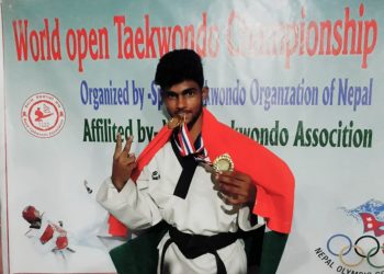 Ehsas Hota poses with his gold medals at Rupandehi in Nepal