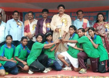 Jagatsinghpur girls pose with their winners’ trophy along with guests at Puri, Thursday    