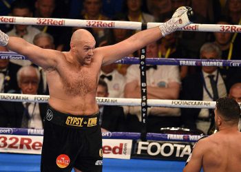 Tyson Fury (L) ended his exile with an untroubled win over Sefer Seferi at Manchester, Saturday