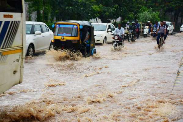 Nor'wester rain cripples normal life, train services hit in Capital ...