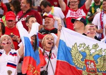 Russian fans celebrate after their win against Saudi Arabia in the World Cup opener in Moscow, Thursday