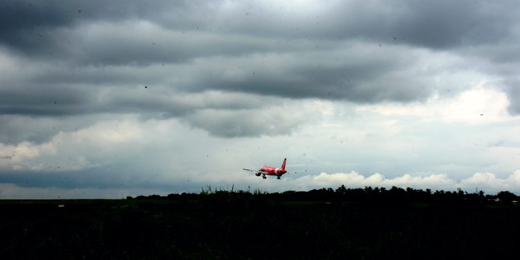 An Aeroplane approaches the landing strip at Biju Patnaik International Airport under an overcast sky in Bhubaneswar Thursday