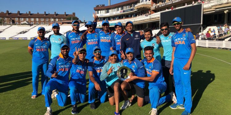 India A players pose with the winners’ shield at the Oval, Monday