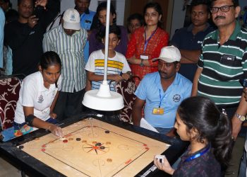 Participants in action during the All India Invitational Carrom Tournament at Cuttack, Friday     