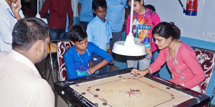 Players in action during the All India Invitational Carrom tournament at Cuttack, Thursday     