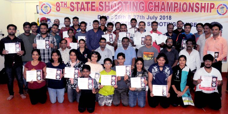 Winners of Odisha State Shooting Championship pose with their certificates along with guests in Bhubaneswar, Sunday      