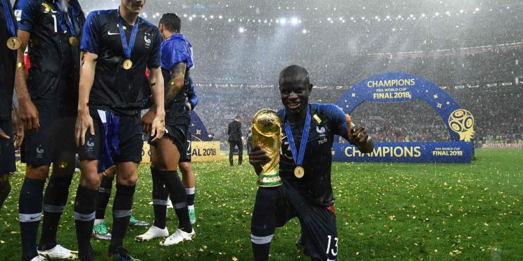 N'Golo Kante poses with the World Cup at the Luzhniki Stadium