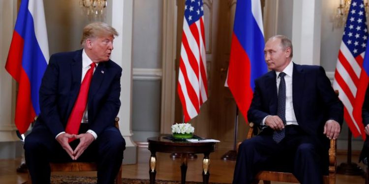 President Trump and Russia’s President Vladimir Putin meet in Helsinki, Finland, Monday. 	REUTERS photo