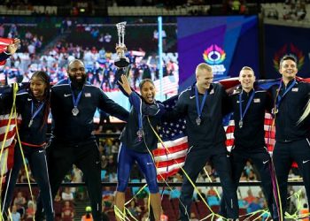 The USA team celebrate their victory in the Athletics World Cup in London, Sunday