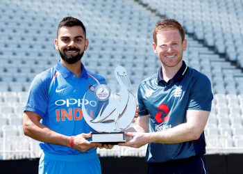 Indian captain Virat Kohli(L) and England skipper Eoin Morgan pose with the ODI trophy, Wednesday