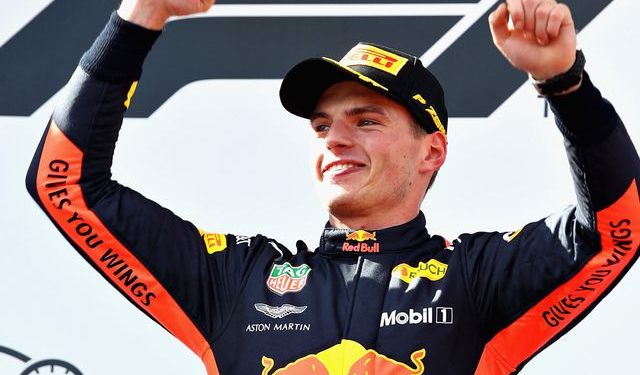 Max Verstappen celebrates after winning the Austrian Grand Prix title at Spielberg, Sunday