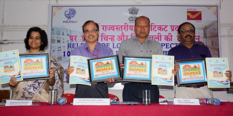 (2nd from L) CPMG of Odisha circle, Santosh Kumar Kamila, releasing the logo and prospectus of the 10th State Level Philatelic Exhibition, ODIPEX-2018 in Bhubaneswar, Wednesday