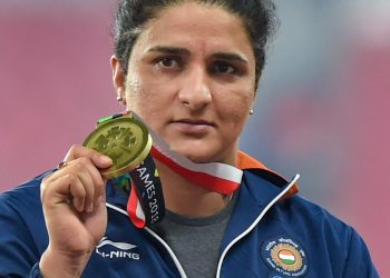 Bronze medallist Seema Punia at the medal ceremony of women's discus throw event, at the Asian Games