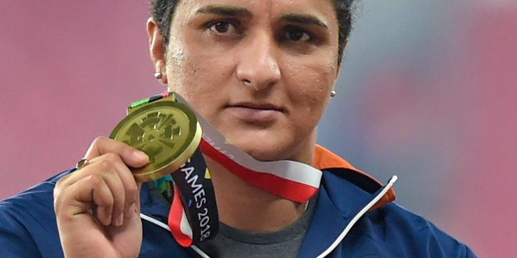 Bronze medallist Seema Punia at the medal ceremony of women's discus throw event, at the Asian Games