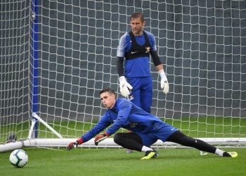 Custodian Kepa Arrizabalaga dives to his right for a save during Chelsea’s training session, Thursday