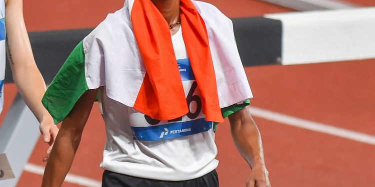 India's Sudha Singh after winning the silver medal in women's 3000m steeplechase competition at the Asian Games