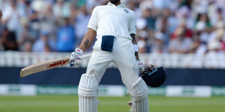 India captain Virat Kohli exults after reaching his maiden Test century on English soil at Edgbaston, Thursday