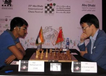 VS Rathanvel (L) plays against his Vietnam opponent