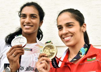 Indian shuttlers at Asian Games Silver medallist PV Sindhu and Bronze medallist Saina Nehwal pose for a photo after a press conference in Hyderabad