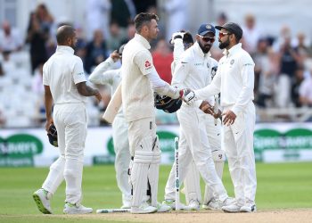 India captain Virat Kohli (R) shakes hand with England’s James Anderson after completing the victory in the third Test at Trent Bridge, Wednesday 