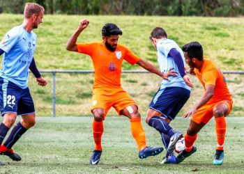 India U-23 (orange) and Sydney FC players in action during their match in Sydney, Tuesday