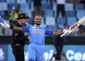 Shikhar Dhawan celebrates after scoring his 14th ODI century against Hong Kong in Dubai