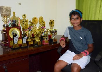 Sohini poses with the trophies she has won in the last 10 months