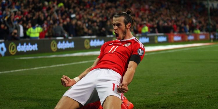 Gareth Bale celebrates after scoring against Republic of Ireland at Cardiff, Thursday