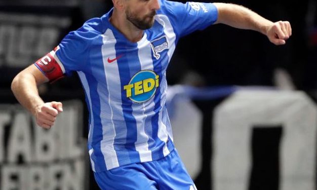 Hertha Berlin captain Vedad Ibisevic celebrates after scoring the opener against Bayern Munich, Friday