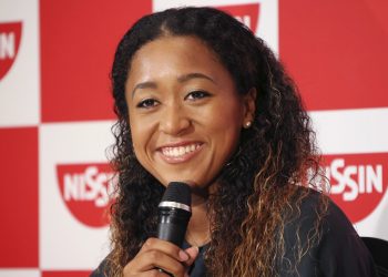 Naomi Osaka smiles during a press conference in Yokohama, Thursday