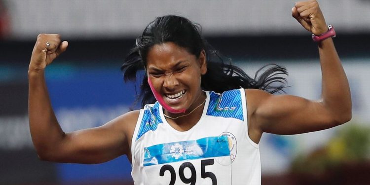 Swapna Barman reacts after winning gold in Heptathlon at Asian Games