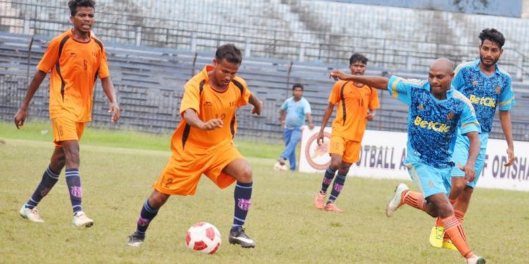 Town Club and YVGC players in action during their match at Barabati Stadium, Tuesday