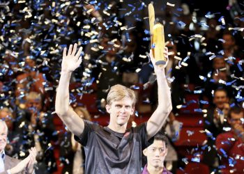 Kevin Anderson poses with the winner’s trophy in Vienna, Sunday  