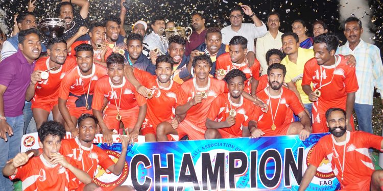 Sunrise Club players pose with the winners’ trophy and medals along with guests in Cuttack, Sunday   