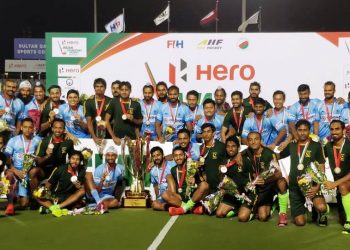 India and Pakistan players pose with the joint winners’ trophy and medals in Muscat, Sunday     