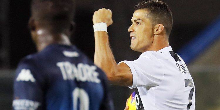 Cristiano Ronaldo celebrates after scoring his side's opening goal against Empoli