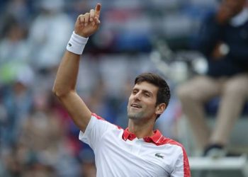 Novak Djokovic celebrates after his win, Friday