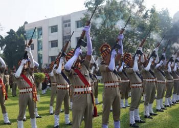 Police personnel pay gun salutes to martyrs during the celebration of 59th state-level Police Commemoration Day in Cuttack, Sunday