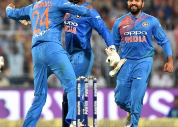 Krunal Pandey celebrates the wicket of West Indies batsman Keiron Pollard at Kolkata