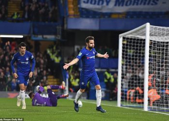 Cesc Fabregas celebrates after scoring the winning goal against Derby County in London, Wednesday