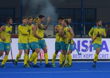 Australia players celebrate after scoring against Ireland, Friday