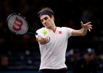 Roger Federer plays a forehand during his match against Fabio Fognini (not in pic), Thursday