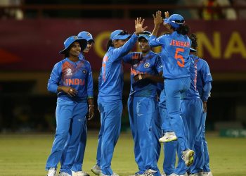 Indian players celebrate after dismissing an England batswoman during their second warm-up match, Wednesday