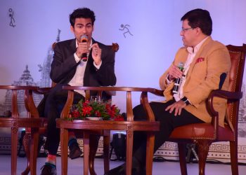 Md Kaif (L) in conversation with moderator Arup Ghosh at the ESLF in Bhubaneswar, Saturday   