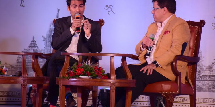 Md Kaif (L) in conversation with moderator Arup Ghosh at the ESLF in Bhubaneswar, Saturday   