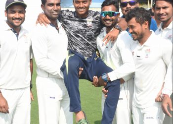 Odisha players carry Rajesh Mohanty on their laps after victory against Assam in Guwahati, Thursday   